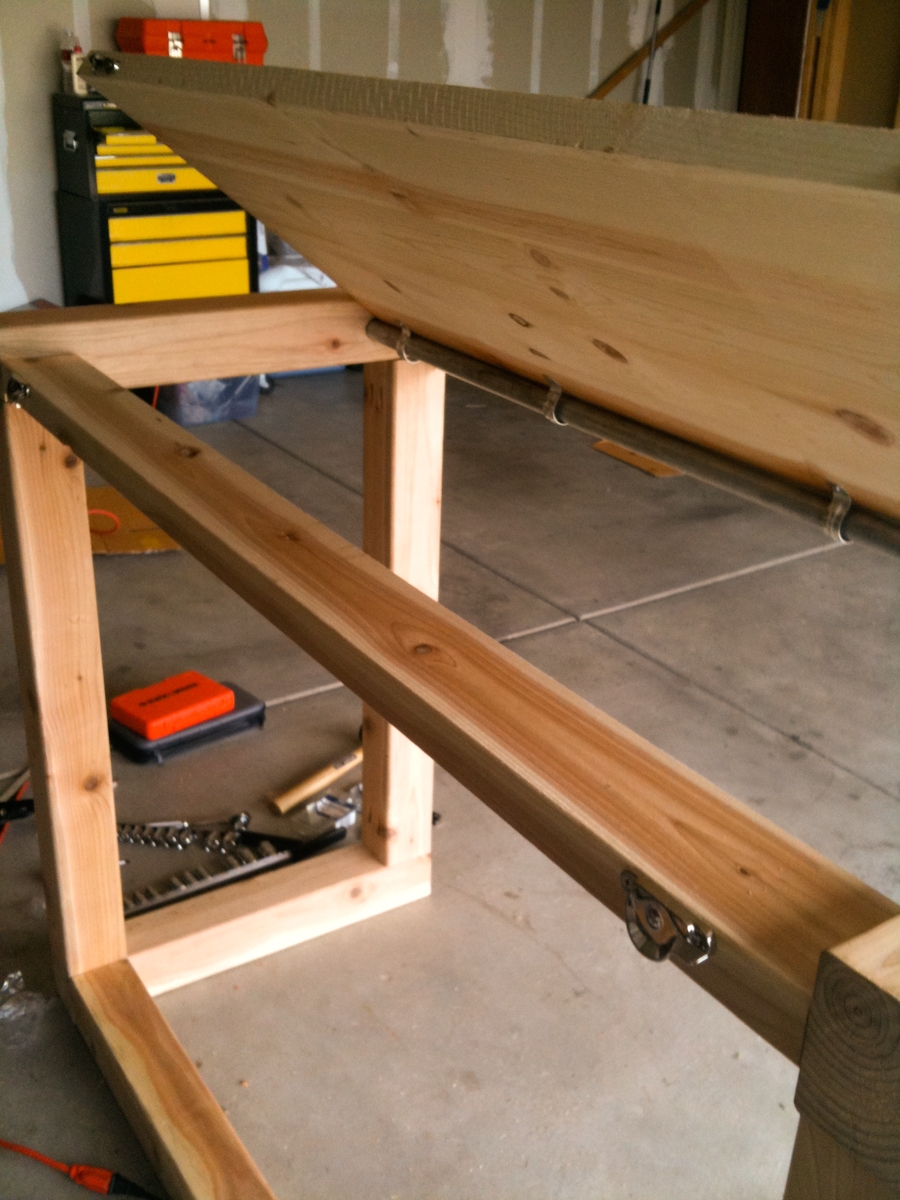 Stability 2x4 that the top rests on of a standing drafting table